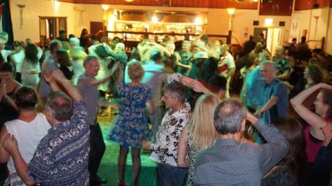 dancing salsa at the Canberra Club
