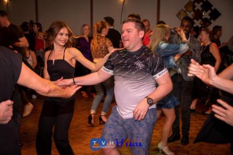 Two friends dancing to salsa music Two friends dancing to salsa music