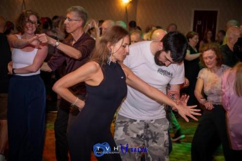 Two people dancing salsa at the Canberra Club Two people dancing salsa at the Canberra Club