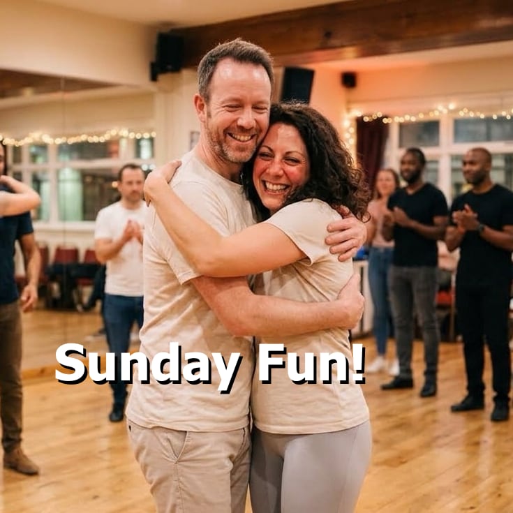 couple hugging looking happy